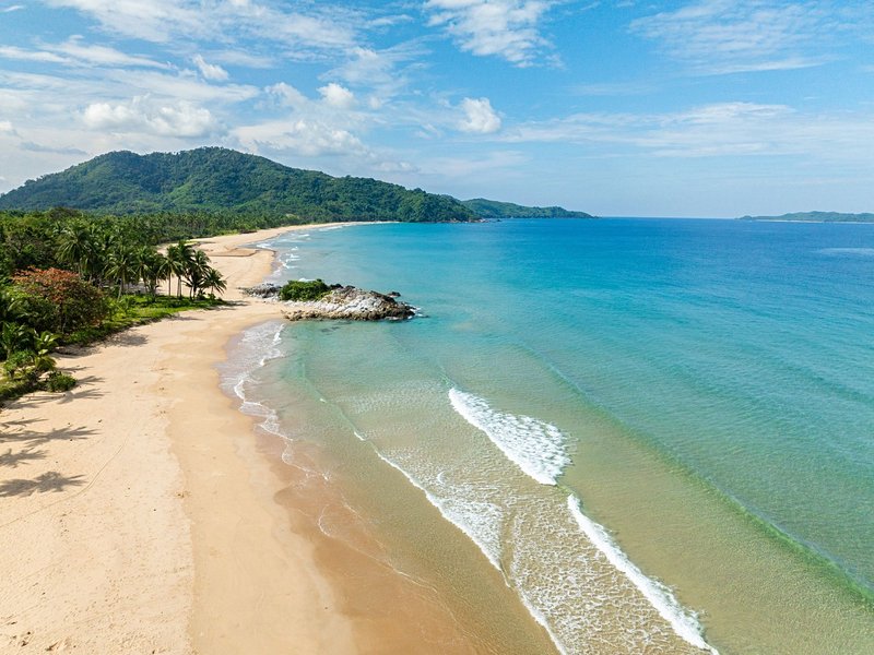 Surfer les vagues de Duli Beach