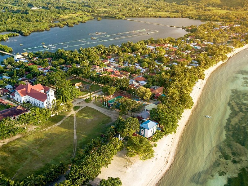 Découvrir Anda : plages et grottes secrètes