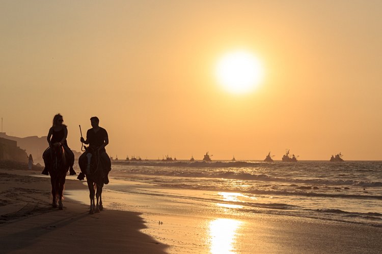 Faire une balade à cheval sur le sable