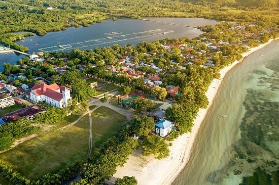 Découvrir Anda : plages et grottes secrètes